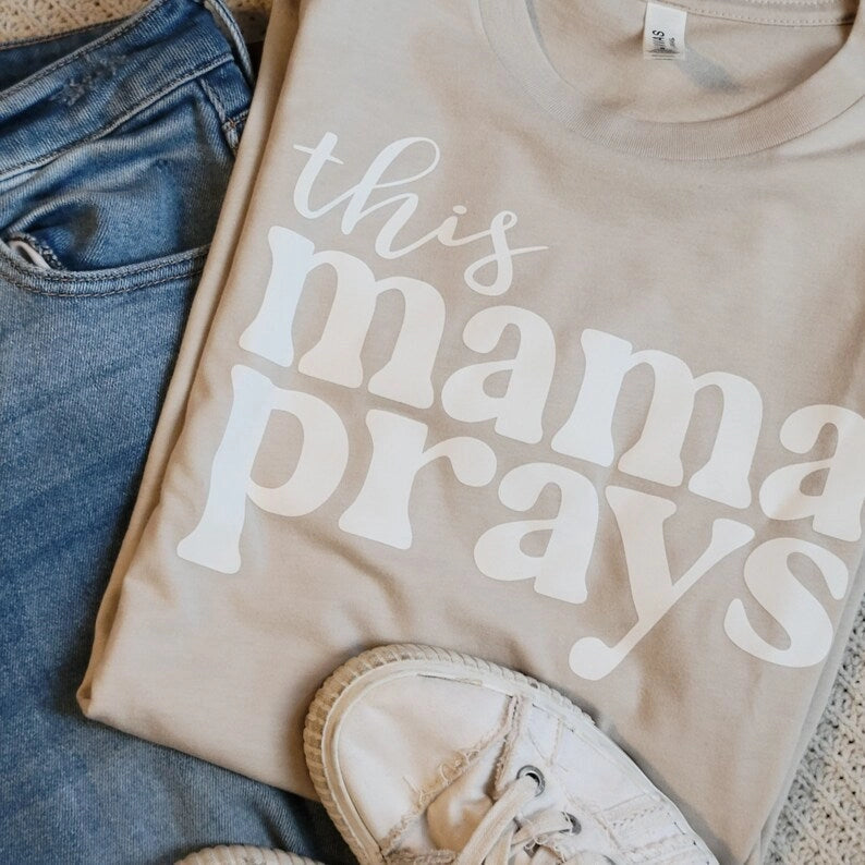 This Mama Prays Graphic Tee